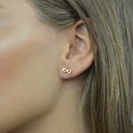 Conjunto em aço infinito dourado