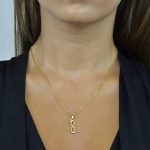 Conjunto em aço infinito dourado