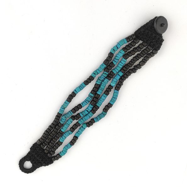 Pulseira artesanal de coco e crochê